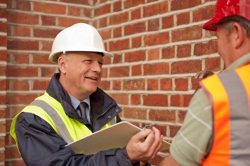 IMAGE OF TWO MEN TALKING - BUILDING A TAILORED POLICY WITH FMB INSURANCE